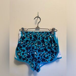 Justice, girls youth blue and black cheetah print athletic shorts w mesh sides